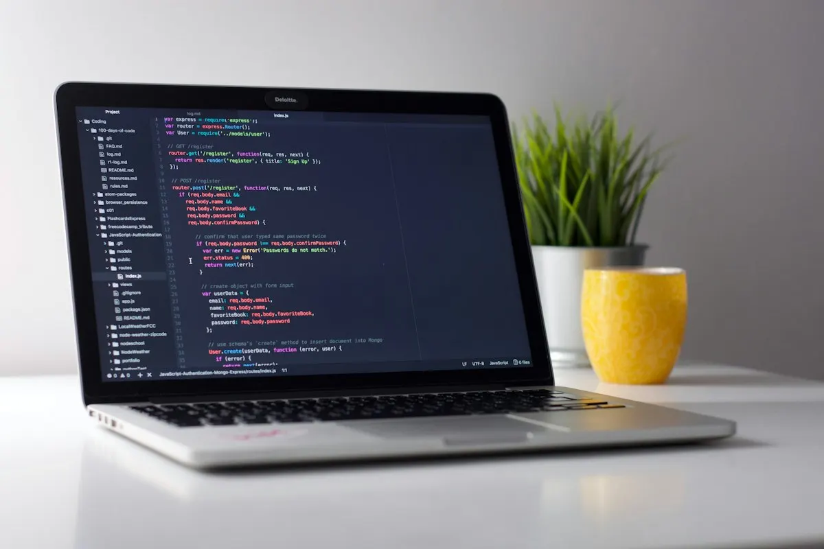 Developer workspace with code on screen