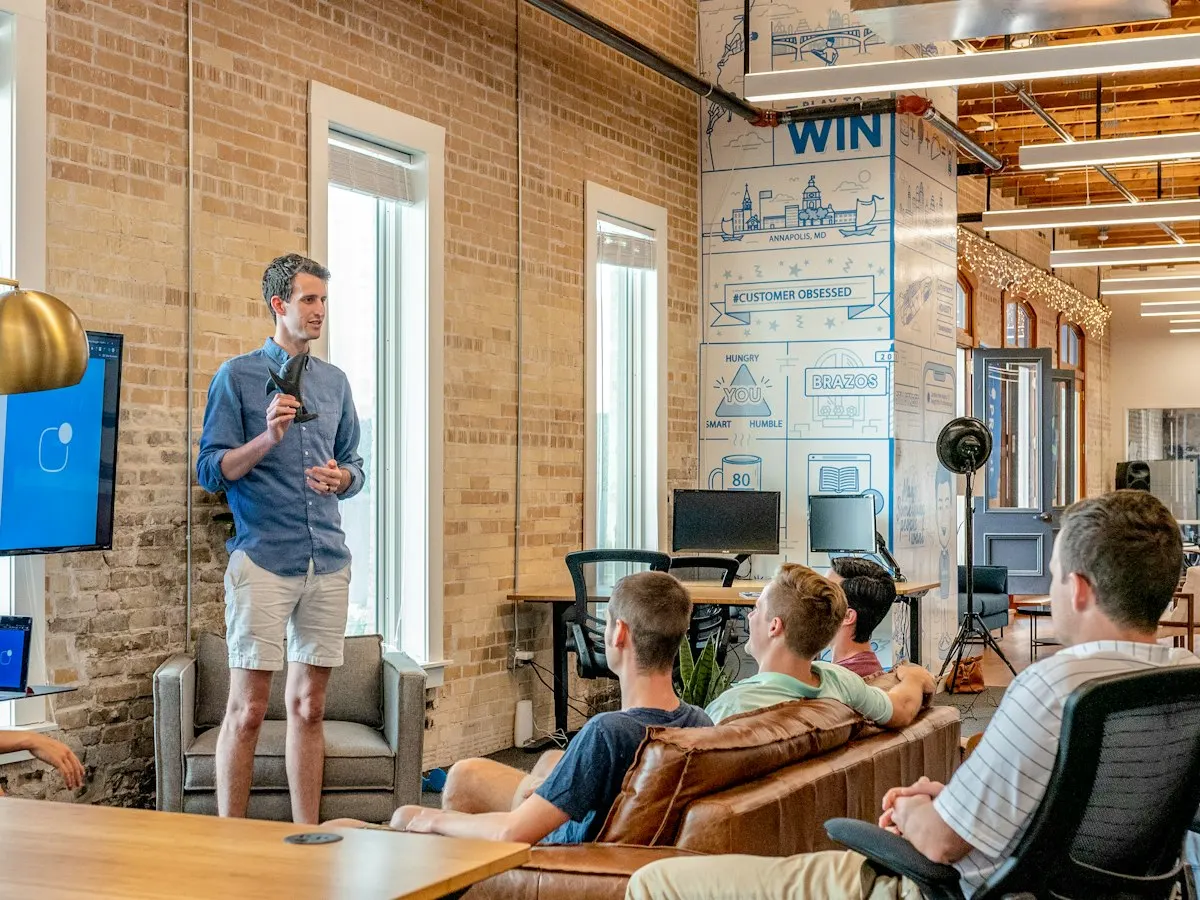 Strategist presenting to a client team