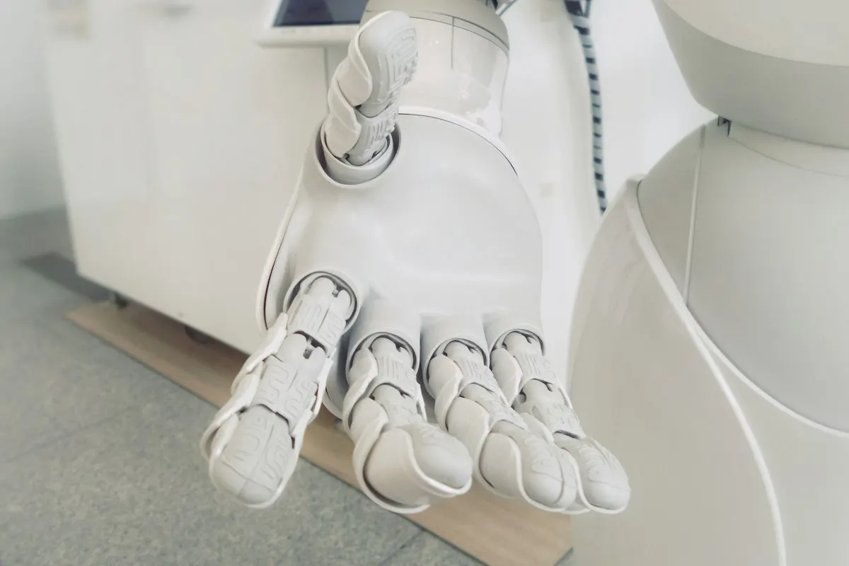 Robot hand reaching forward