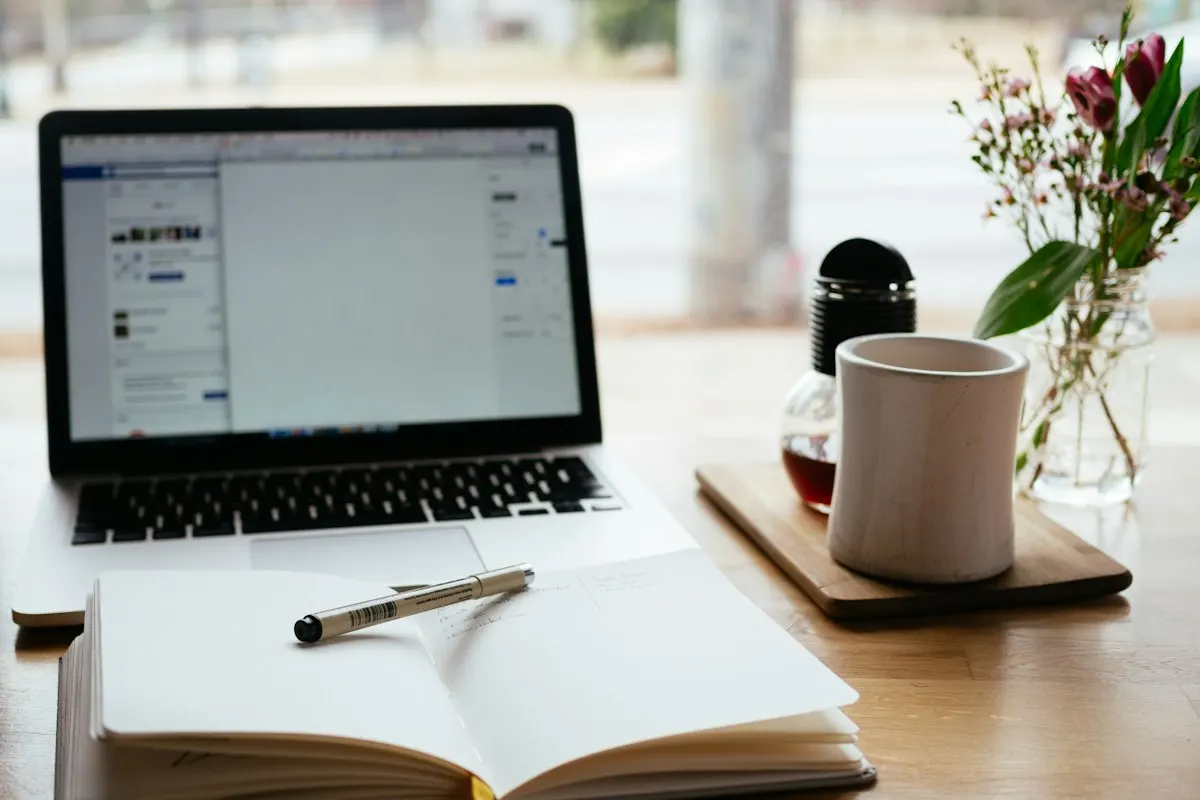 Blog draft with coffee and a notebook